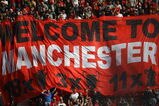 MANCHESTER, ENGLAND - SEPTEMBER 20:  Manchester United fans display a banner during the Barclays Premier League match between Manchester United and Manchester City at Old Trafford on September 20, 2009 in Manchester, England. (Photo by Alex Livesey/Getty Images)