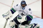 CHICAGO - MAY 07:  Goalie Roberto Luongo #1 of the Vancouver Canucks makes a save against the Chicago Blackhawks during Game Four of the Western Conference Semifinal Round of the 2009 Stanley Cup Playoffs on May 7, 2009 at the United Center in Chicago, Illinois.  (Photo by Jonathan Daniel/Getty Images)