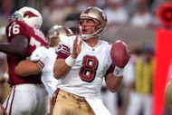 27 Sep 1999: Steve Young #8 of the San Francisco 49ers moves back to pass the ball during the game against the Arizona Cardinals at the Sun Devil Stadium in Tempe, Arizona. The 49ers defeated the Cardinals 24-10.