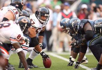 SEATTLE - AUGUST 16:  Center Olin Kreutz #57 of the Chicago Bears gets ready to hike the ball during the game against the Seattle Seahawks at Qwest Field on August 16, 2008 in Seattle, Washington. The Seahawks defeated the Bears 29-26. (Photo by Otto Greule Jr/Getty Images)