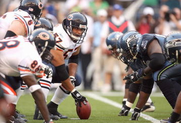 SEATTLE - AUGUST 16:  Center Olin Kreutz #57 of the Chicago Bears gets ready to hike the ball during the game against the Seattle Seahawks at Qwest Field on August 16, 2008 in Seattle, Washington. The Seahawks defeated the Bears 29-26. (Photo by Otto Greule Jr/Getty Images)