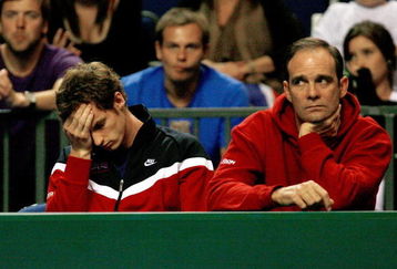 LIVERPOOL, ENGLAND - SEPTEMBER 20:  Andy Murray of Great Britain looks on during the fifth rubber match between Daniel Evans of Great Britain and Michal Przysiezny of Poland in the Davis Cup tie between Great Britain and Poland at Liverpool Echo Arena on September 20, 2009 in Liverpool, England.  (Photo by Clive Rose/Getty Images)
