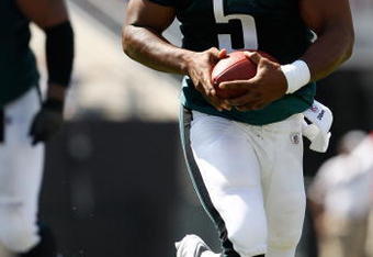 CHARLOTTE, NC - SEPTEMBER 13:  Quarterback Donovan McNabb #5 of the Philadelphia Eagles runs with the ball in the second half of their NFL season opener against the Carolina Panthers at Bank of America Stadium on September 13, 2009 in Charlotte, North Carolina. McNabb did not return to the game.  (Photo by Streeter Lecka/Getty Images)