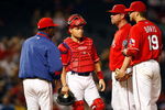 ARLINGTON, TX - SEPTEMBER 12:  (L-R) Manager Ron Washington, Ivan Rodriguez #7, Kevin Millwood #33 and Chris Davis #19 of the Texas Rangers on September 12, 2009 at the Ballpark in Arlington, Texas.  (Photo by Ronald Martinez/Getty Images)