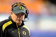 BOISE, ID - SEPTEMBER 3:  Oregon Ducks head coach Chip Kelly looks out onto the field during the third quarter of the game against the Boise State Broncos on September 3, 2009 in Boise, Idaho. Boise State won the game 19-8. (Photo by Steve Dykes/Getty Images)
