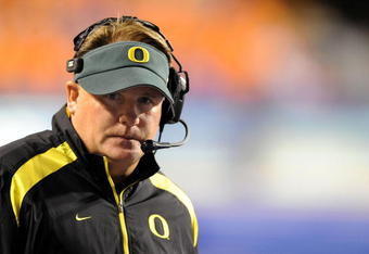 BOISE, ID - SEPTEMBER 3:  Oregon Ducks head coach Chip Kelly looks out onto the field during the third quarter of the game against the Boise State Broncos on September 3, 2009 in Boise, Idaho. Boise State won the game 19-8. (Photo by Steve Dykes/Getty Images)