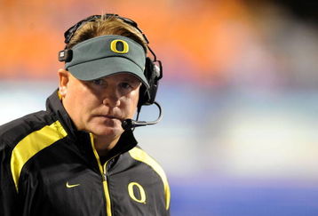 BOISE, ID - SEPTEMBER 3:  Oregon Ducks head coach Chip Kelly looks out onto the field during the third quarter of the game against the Boise State Broncos on September 3, 2009 in Boise, Idaho. Boise State won the game 19-8. (Photo by Steve Dykes/Getty Images)