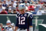 EAST RUTHERFORD, NJ - SEPTEMBER 20: Tom Brady #12 of the New England Patriots walks to the huddle during the game on September 20, 2009 at Giants Stadium in East Rutherford, New Jersey. (Photo by Jared Wickerham/Getty Images)