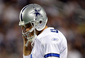 ARLINGTON, TX - SEPTEMBER 20:  Quarterback Tony Romo #9 of the Dallas Cowboys walks off the field during play against the New York Giants at Cowboys Stadium on September 20, 2009 in Arlington, Texas.  (Photo by Ronald Martinez/Getty Images)