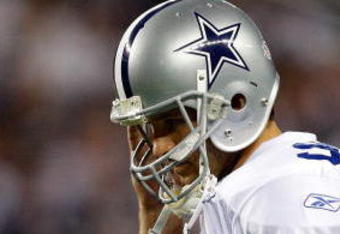 ARLINGTON, TX - SEPTEMBER 20:  Quarterback Tony Romo #9 of the Dallas Cowboys walks off the field during play against the New York Giants at Cowboys Stadium on September 20, 2009 in Arlington, Texas.  (Photo by Ronald Martinez/Getty Images)