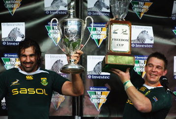 HAMILTON, NEW ZEALAND - SEPTEMBER 12: Victor Matfield (L) and John Smit (R) hold the Tri Nations and Freedom Cups following the Tri Nations Test between the New Zealand All Blacks and South African Springboks at Waikato Stadium on September 12, 2009 in Hamilton, New Zealand.  (Photo by Phil Walter/Getty Images)