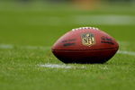 DENVER - SEPTEMBER 20:  The football awaits action as it lies on the turf as the Cleveland Browns face the Denver Broncos during NFL action at Invesco Field at Mile High on September 20, 2009 in Denver, Colorado. The Broncos defeated the Browns 27-6.  (Photo by Doug Pensinger/Getty Images)