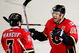 CALGARY, AB - APRIL 22: Jarome Iginla #12 and Dion Phaneuf #3 of the Calgary Flames celebrate Iginla's empty net goal to seal the win against the Chicago Blackhawks in Game Four of the Western Conference Quarterfinals of the 2009 Stanley Cup Playoffs on April 22, 2009 at the Pengrowth Saddledome in Calgary, Alberta, Canada. (Photo by Mike Ridewood/Getty Images)