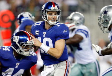 ARLINGTON, TX - SEPTEMBER 20:  Quarterback Eli Manning #10 of the New York Giants drops back to pass against the Dallas Cowboys at Cowboys Stadium on September 20, 2009 in Arlington, Texas.  (Photo by Ronald Martinez/Getty Images)