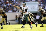 PHILADELPHIA - SEPTEMBER 20:  Kevin Kolb #4 of the Philadelphia Eagles passes under pressure from the Scott Shanle #58 of the New Orleans Saints during their game at Lincoln Financial Field on September 20, 2009 in Philadelphia, Pennsylvania.  (Photo by Jeff Zelevansky/Getty Images)