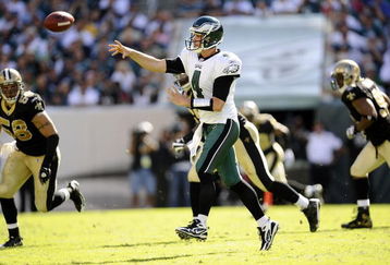 PHILADELPHIA - SEPTEMBER 20:  Kevin Kolb #4 of the Philadelphia Eagles passes under pressure from the Scott Shanle #58 of the New Orleans Saints during their game at Lincoln Financial Field on September 20, 2009 in Philadelphia, Pennsylvania.  (Photo by Jeff Zelevansky/Getty Images)