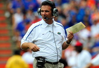 GAINESVILLE, FL - SEPTEMBER 12:  Head coach Urban Meyer of the Florida Gators watches the action during the game against the Troy Trojans at Ben Hill Griffin Stadium on September 12, 2009 in Gainesville, Florida.  (Photo by Sam Greenwood/Getty Images)