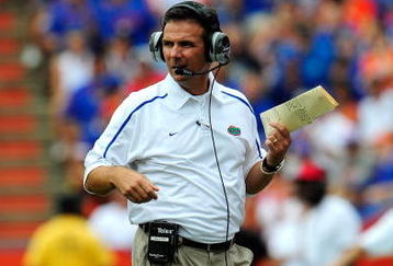 GAINESVILLE, FL - SEPTEMBER 12:  Head coach Urban Meyer of the Florida Gators watches the action during the game against the Troy Trojans at Ben Hill Griffin Stadium on September 12, 2009 in Gainesville, Florida.  (Photo by Sam Greenwood/Getty Images)