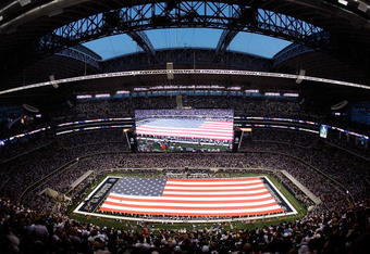 ARLINGTON, TX - SEPTEMBER 20:  An American flag on the field before a game between the New York Giants and the Dallas Cowboys at Cowboys Stadium on September 20, 2009 in Arlington, Texas.  (Photo by Ronald Martinez/Getty Images)