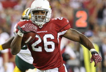 GLENDALE, AZ - AUGUST 28:  Running back Beanie Wells #26 of the Arizona Cardinals rushes for a touchdown during the second quarter against the Green Bay Packers at the University of Phoenix Stadium on August 28, 2009 in Glendale, Arizona.  (Photo by Christian Petersen/Getty Images)