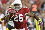 GLENDALE, AZ - AUGUST 28:  Running back Beanie Wells #26 of the Arizona Cardinals rushes for a touchdown during the second quarter against the Green Bay Packers at the University of Phoenix Stadium on August 28, 2009 in Glendale, Arizona.  (Photo by Christian Petersen/Getty Images)
