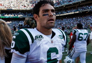 EAST RUTHERFORD, NJ - SEPTEMBER 20:  Mark Sanchez #6 of the New York Jets walks on the field with the game ball after defeating the New England Patriots at Giants Stadium on September 20, 2009 in East Rutherford, New Jersey.  (Photo by Nick Laham/Getty Images)