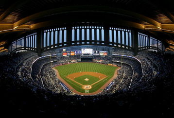 NEW YORK - APRIL 03:  Chien-Ming Wang #40 of the New York Yankees pitches the first pitch of the game to Aaron Miles #7 of the Chicago Cubs during their game at Yankee Stadium on April 3, 2009 in the Bronx borough of New York City. Today's exhibition game is the first game to played in the new Yankee Stadium.  (Photo by Ezra Shaw/Getty Images)