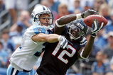NASHVILLE, TN - SEPTEMBER 20:  Jacoby Jones #12 of the Houston Texans catches a touchdown pass while defended by Cortland Finnegan #31 of the Tennessee Titans during the  NFL game at LP Field on September 20, 2009 in Nashville, Tennessee. The Texans won 34-31.  (Photo by Andy Lyons/Getty Images)