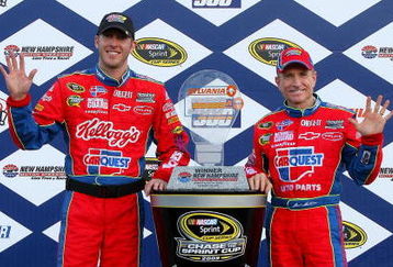 LOUDON, NH - SEPTEMBER 20:  Mark Martin (R), driver of the #5 CARQUEST/Kellogg's Chevrolet, and crew chief Alan Gustafson celebrates with the trophy in victory lane after winning the NASCAR Sprint Cup Series Sylvania 300 at the New Hampshire Motor Speedway on September 20, 2009 in Loudon, New Hampshire.  (Photo by Jason Smith/Getty Images for NASCAR)