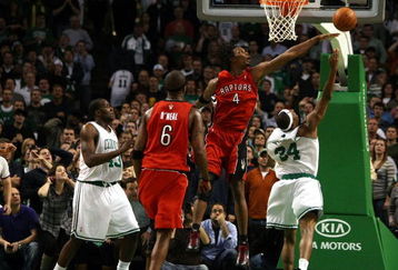 BOSTON - NOVEMBER 10:  Paul Pierce #34 of the Boston Celtics makes the shot despite the best effort of Chris Bosh #4 of the Toronto Raptors on November 10,  2008 at TD Banknorth Garden in Boston, Massachusetts. Kendrick Perkins of the Celtics and Jermaine O'Neal #6 of the Raptors look on. The Celtics defeated the Toronto Raptors 94-87.  NOTE TO USER: User expressly acknowledges and agrees that, by downloading and/or using this Photograph, user is consenting to the terms and conditions of the Getty Images License Agreement.  (Photo by Elsa/Getty Images)