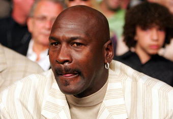 LAS VEGAS - MAY 05:  Hall of fame NBA player Michael Jordan looks on during the fight between Floyd Mayweather Jr. and Oscar De La Hoya during their WBC super welterweight championship fight at the MGM Grand Garden Arena May 5, 2007 in Las Vegas, Nevada. Mayweather defeated De La Hoya by split decision. (Photo by Al Bello/Getty Images)