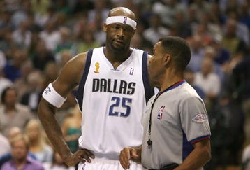 DALLAS - JUNE 20:   Erick Dampier #25 of the Dallas Mavericks discusses a call with referee Dan Crawford in  the first half of game six of the 2006 NBA Finals against the Miami Heat on June 20, 2006 at American Airlines Center in Dallas, Texas.  NOTE TO USER: User expressly acknowledges and agrees that, by downloading and or using this photograph, User is consenting to the terms and conditions of the Getty Images License Agreement.  (Photo by Ronald Martinez/Getty Images)