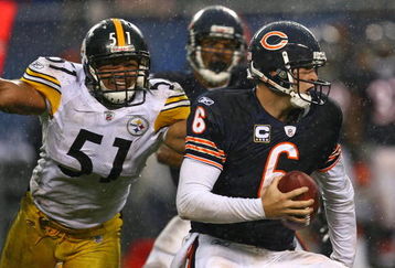 CHICAGO - SEPTEMBER 20: Jay Cutler #6 of the Chicago Bears avoids pressure from James Farrior #51 of the Pittsburgh Steelers as he looks for a receiver on September 20, 2009 at Soldier Field in Chicago, Illinois. The Bears defeated the Steelers 17-14. (Photo by Jonathan Daniel/Getty Images)