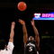 NEW YORK - MARCH 12:  Deonta Vaughn #5 of the Cincinnati Bearcats shoots over Ronald Ramon #4 of the Pittsburgh Panthers during the 2008 Big East Men's Basketball Championship at Madison Square Garden on March 12, 2008 in New York City.  (Photo by Jim McIsaac/Getty Images)