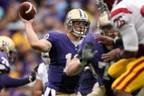 SEATTLE - SEPTEMBER 19:  Quarterback Jake Locker #10 of the Washington Huskies passes against the USC Trojans on September 19, 2009 at Husky Stadium in Seattle, Washington. The Huskies defeated the Trojans 16-13. (Photo by Otto Greule Jr/Getty Images)