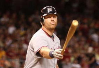 PHOENIX - MAY 08:  Adam Dunn #44 of the Washington Nationals flips his bat after striking out against the Arizona Diamondbacks during the game at Chase Field on May 8, 2009 in Phoenix, Arizona. The Nationals defeated the Diamondbacks 5-4.  (Photo by Christian Petersen/Getty Images)