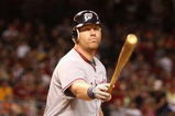 PHOENIX - MAY 08:  Adam Dunn #44 of the Washington Nationals flips his bat after striking out against the Arizona Diamondbacks during the game at Chase Field on May 8, 2009 in Phoenix, Arizona. The Nationals defeated the Diamondbacks 5-4.  (Photo by Christian Petersen/Getty Images)