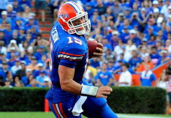 GAINESVILLE, FL - SEPTEMBER 19:  Tim Tebow #15 of the Florida Gators scrambles for yardage during the game against the Tennessee Volunteers at Ben Hill Griffin Stadium on September 19, 2009 in Gainesville, Florida.  (Photo by Sam Greenwood/Getty Images)