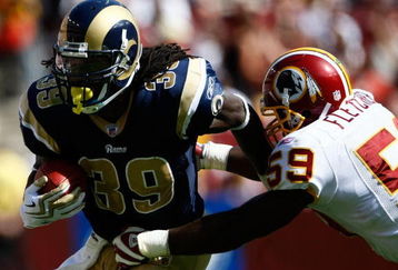 LANDOVER, MD - SEPTEMBER 20:  Steven Jackson #39 of the St. Louis Rams is tackled by London Fletcher #59 of the Washington Redskins during their game on September 20, 2009 at FedEx Field in Landover, Maryland.  The Redskins defeated the Rams by a score of 9-7.  (Photo by Win McNamee/Getty Images)