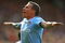 MANCHESTER, ENGLAND - SEPTEMBER 20:  Craig Bellamy of Manchester City celebrates scoring his team's second goal during the Barclays Premier League match between Manchester United and Manchester City at Old Trafford on September 20, 2009 in Manchester, England.  (Photo by Alex Livesey/Getty Images)