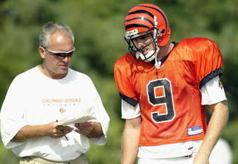 GEORGETOWN, KY - JULY 28:  Quarterback Carson Palmer #9 and offensive coordinator Bob Bratkowski of the Cincinnati Bengals talk during training camp at Georgetown College on July 28, 2003 in Georgetown, Kentucky. (Photo by Andy Lyons/Getty Images)