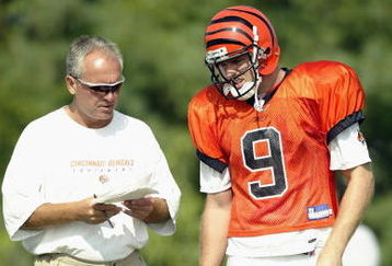 GEORGETOWN, KY - JULY 28:  Quarterback Carson Palmer #9 and offensive coordinator Bob Bratkowski of the Cincinnati Bengals talk during training camp at Georgetown College on July 28, 2003 in Georgetown, Kentucky. (Photo by Andy Lyons/Getty Images)