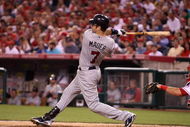 ANAHEIM, CA - JULY 24:  Joe Mauer #7 of the Minnesota Twins hits his second home run of the game in the sixth inning against the Los Angeles Angels of Anaheim on July 24, 2009 at Angel Stadium in Anaheim, California.  (Photo by Stephen Dunn/Getty Images)