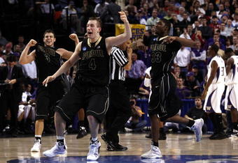 PORTLAND, OR - MARCH 21:  (C) Robbie Hummel #4 of the Purdue Boilermakers along with (L) Chris Kramer #3 and (R) E'Twaun Moore #33 celebrate after defeating the Washington Huskies during the second round of the NCAA Division I Men's Basketball Tournament at the Rose Garden on March 21, 2009 in Portland, Oregon. The Boilermakers defeated the Huskies 76-74 to advance to the Sweet 16.  (Photo by Jonathan Ferrey/Getty Images)