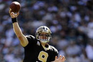 PHILADELPHIA - SEPTEMBER 20:  Drew Brees #9 of the New Orleans Saints looks for an open man during a game against the Philadelphia Eagles at Lincoln Financial Field on September 20, 2009 in Philadelphia, Pennsylvania.  (Photo by Jeff Zelevansky/Getty Images)