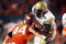 FORT LAUDERDALE, FL - SEPTEMBER 17:  Quarterback Josh Nesbitt #9 of the Georgia Tech Yellow Jackets is brought down by linebacker Colin McCarthy #44 of the Miami Hurricanes at Land Shark Stadium on September 17, 2009 in Fort Lauderdale, Florida. Miami defeated Georgia Tech 33-17.  (Photo by Doug Benc/Getty Images)
