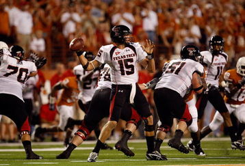 AUSTIN, TX - SEPTEMBER 19:  Quarterback Taylor Potts #15 of the Texas Tech Red Raiders drops back to pass against the Texas Longhorns at Darrell K Royal-Texas Memorial Stadium on September 19, 2009 in Austin, Texas.  (Photo by Ronald Martinez/Getty Images)