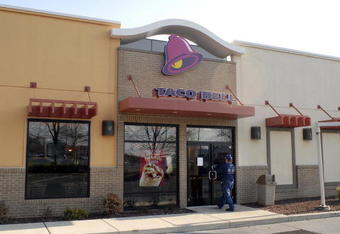 PHILADELPHIA - DECEMBER 7: A man enters a closed Taco Bell restaurant at Franklin Mills Mall December 7, 2006 in Philadelphia, Pennsylvania. Taco Bell restaurants in the Philadelphia area have closed voluntarily for testing, after five people who contracted an E. coli illness, dined at a Taco Bell restaurant before falling ill.  (Photo by William Thomas Cain/Getty Images)