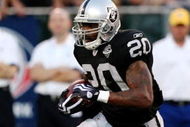 OAKLAND, CA - AUGUST 13:  Darren McFadden #20 of the Oakland Raiders runs the ball against the Dallas Cowboys during the preseason game at Oakland-Alameda County Coliseum on August 13, 2009 in Oakland, California. (Photo by Jed Jacobsohn/Getty Images)