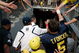 ANN ARBOR, MI - SEPTEMBER 12:  Quarterback Tate Forcier #5 and Michigan head coach Rich Rodriguez give high-fives as they leave the field after beating Notre Dame 38-34 at Michigan Stadium on September 12, 2009 in Ann Arbor, Michigan.  (Photo by Domenic Centofanti/Getty Images)